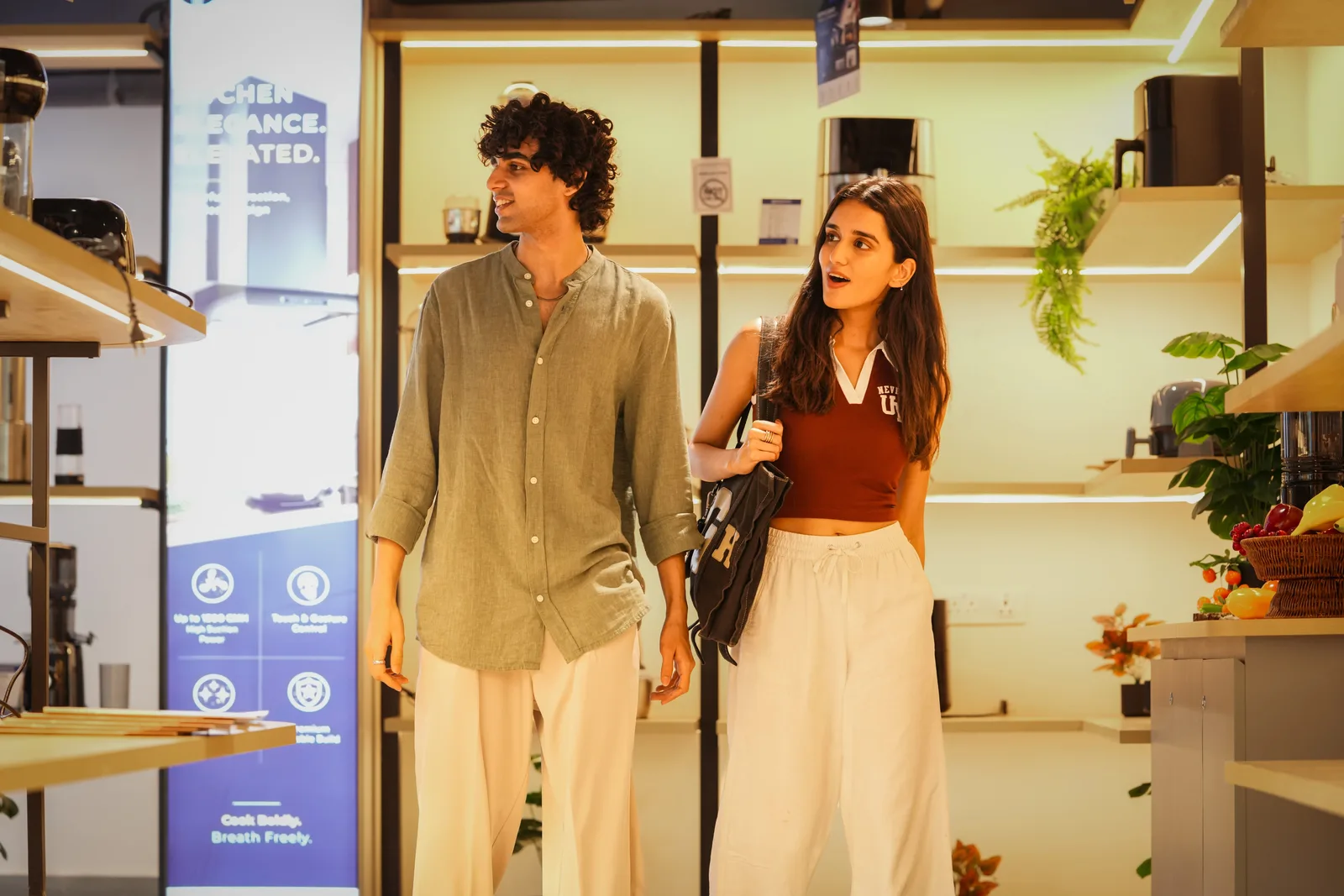 A couple choosing appliances in a Daewoo store